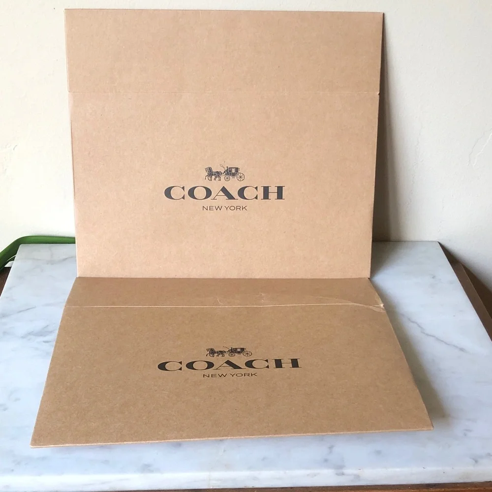 Coach gift boxes. Two gift boxes. They fold flat for easy storage.